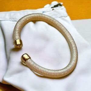 GOLD ESSENZIA FLEXIBLE WIRE CUFF BRACELET IN WHITE/GOLD